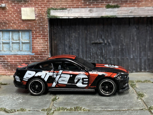 Black 2018 Ford Mustang GT custom with BORLA number 3 livery, right-side view