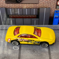 Loose Hot Wheels - Oldsmobile Aurora - Yellow Hot Wheels 1