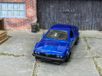 Custom Alfa Romeo GTV6 3.0 with rubber tires, rear three-quarter view