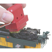 Kadee 236 Speedi cleaner in use on locomotive wheels; locomotive not included