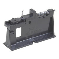 Kadee 701 coupler assembly fixture shown holding a coupler during assembly