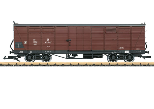 Brown LGB 43602 DR type ggw boxcar 97-12-27 with Era III markings, shown on example track that is not included.