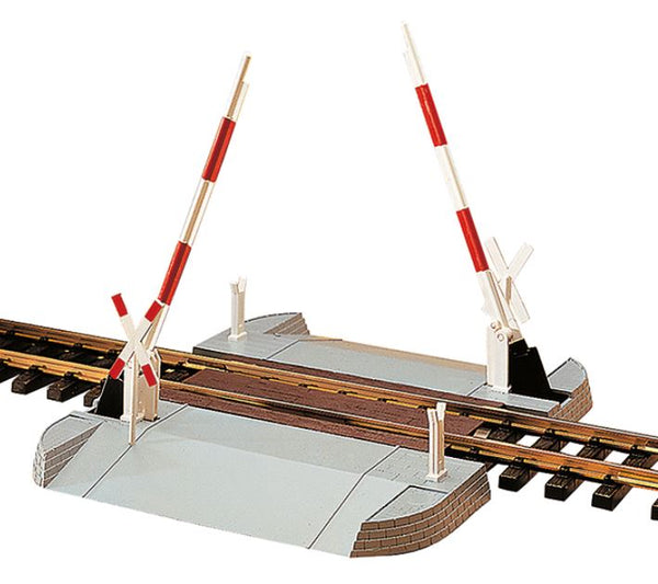 LGB 50650 crossing-gate assembly with both barriers raised, shown around example track that is not included.