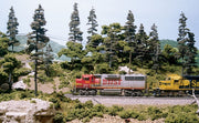 Example trees made with LK953 in a finished layout; trains and other scenery not included