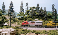 Example trees made with LK953 in a finished layout; trains and other scenery not included