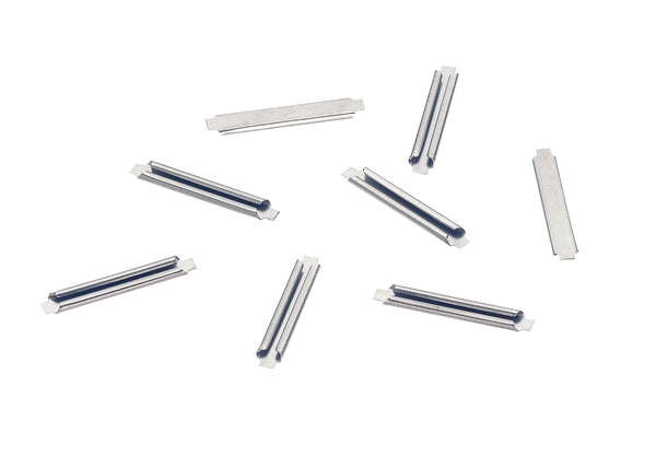 A group of Märklin 74994 metal C-track rail joiners; the package contains 24.