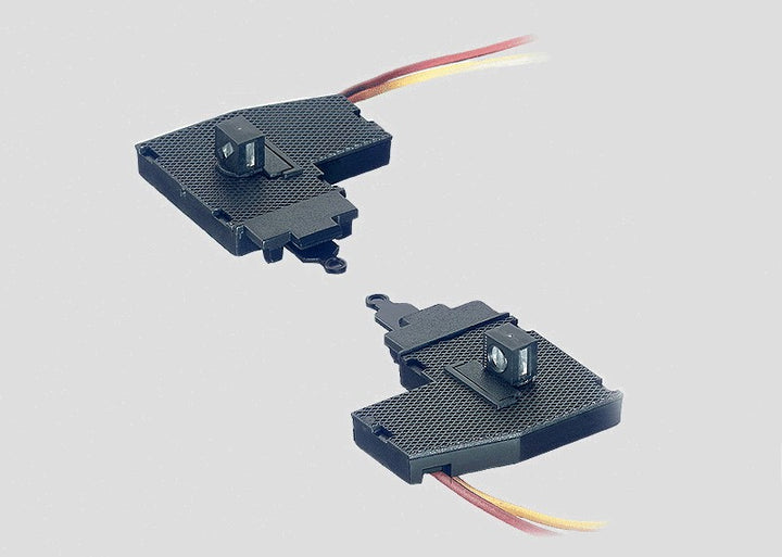 Märklin 7547 pair of left and right K-track turnout lanterns with their lighting leads.
