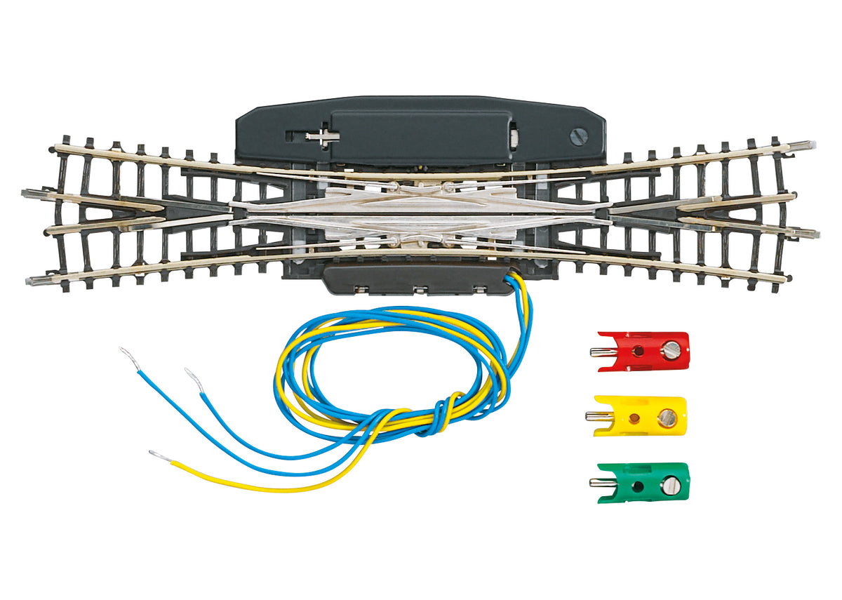 Märklin 8560 Z scale double-slip turnout with its operating mechanism and connection wires.