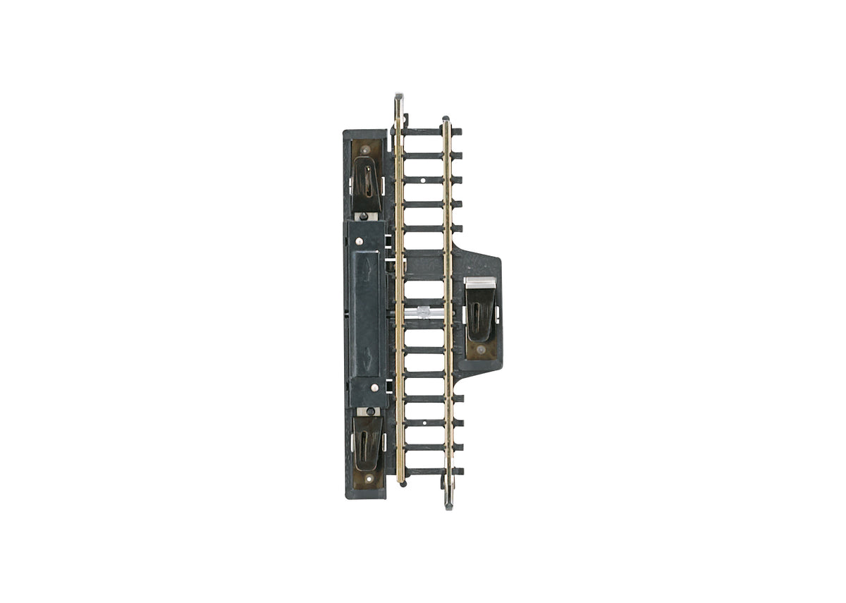 Märklin 8589 straight Z scale circuit track with its switching contacts and terminal clips.