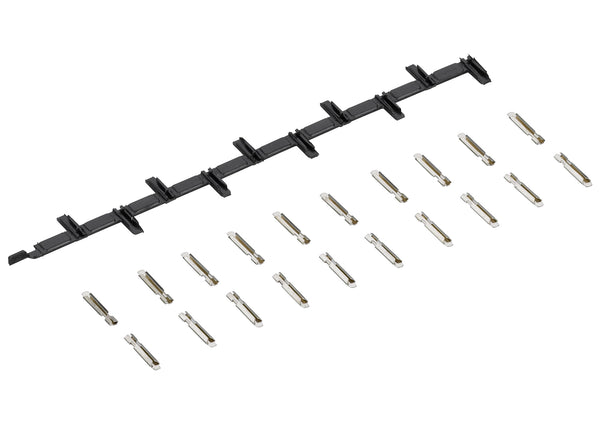 Märklin 8954 set showing the strip of insulated joiners and twenty separate metal rail joiners.