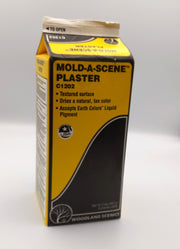 Woodland Scenics C1202 Mold-A-Scene Plaster retail carton, showing the exact part number and net contents.