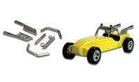 Dune Buster P340 parts beside an example yellow derby car; car not included