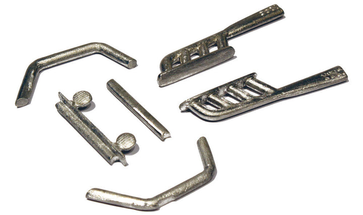 PineCar P340 Dune Buster six loose metal parts with exhaust pipes and roll bar sections