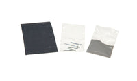 PineCar P359 kit contents with five nail-type axles, wet-dry sandpaper and polishing pumice