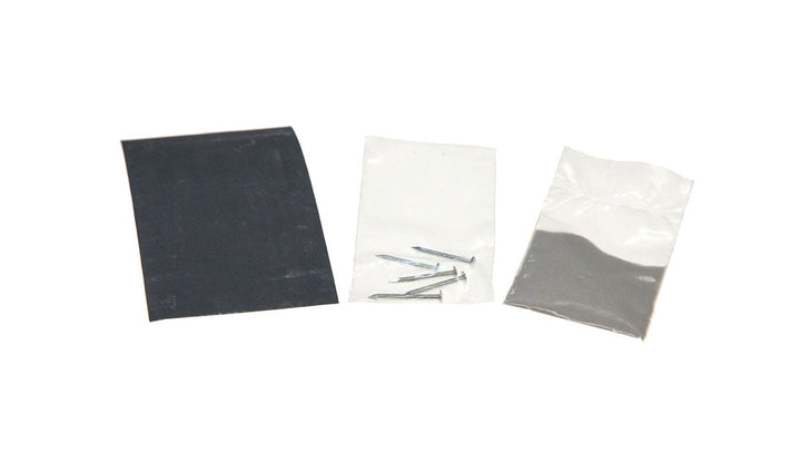 PineCar P359 kit contents with five nail-type axles, wet-dry sandpaper and polishing pumice
