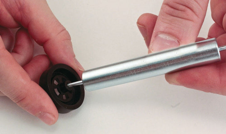 PineCar P4609 Hub Tool being used on a derby wheel