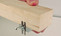 P4611 guide aligning a nail axle in a wooden body; body and axle not included