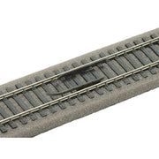 PECO SL-30 decoupler installed between rails as a demonstration; track and ballast not included