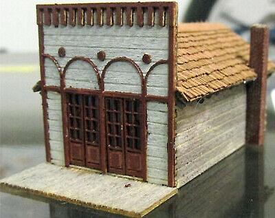 RS Laser Kits 3058 N scale Log Saloon shown as an assembled example
