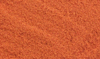 Close-up texture of Woodland Scenics T4646 orange paper flower pollen