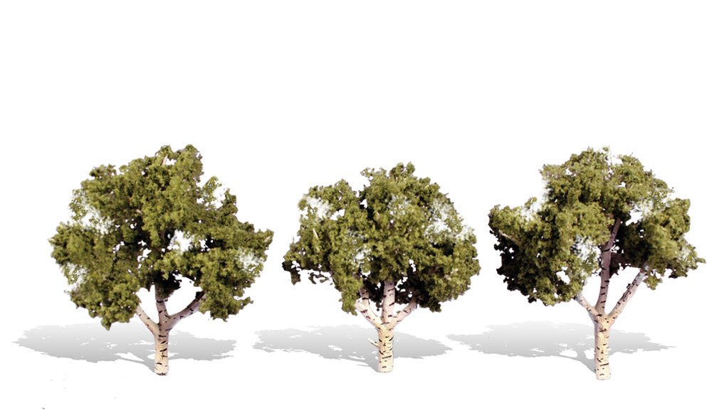Woodland Scenics TR3535 Waters Edge Trees, three ready-made trees with pale birch-style trunks and green foliage.