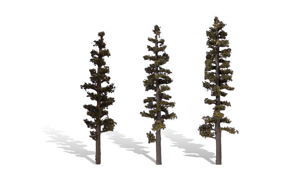 Woodland Scenics TR3562 Standing Timber, three 6–7-inch miniature trees with sparse foliage.