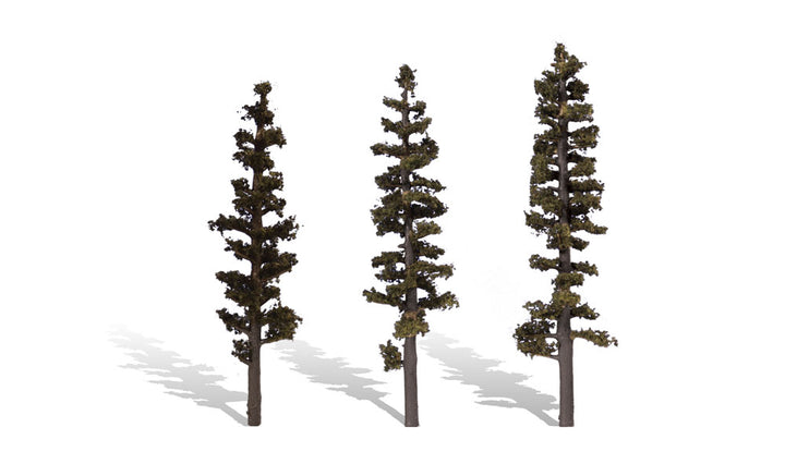 Woodland Scenics TR3562 Standing Timber, three 6–7-inch miniature trees with sparse foliage.