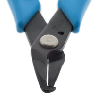 Close-up of the curved catch tip on Xuron 496 split ring pliers