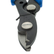 Close-up of the Xuron 501 thumb-adjustable cam and stripping jaws