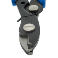Close-up of the Xuron 501 thumb-adjustable cam and stripping jaws
