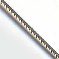 Close-up of the fine teeth on a Zona 36-475 size 3/0 jeweler’s saw blade
