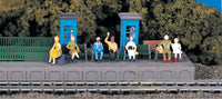 Bachmann 42342 HO scale Sitting Passengers pre-painted figure set in a model railroad scene