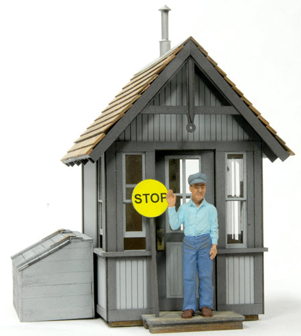 Banta Modelworks 6065 O scale Crossing Shanty kit, assembled front view; figure is separate.