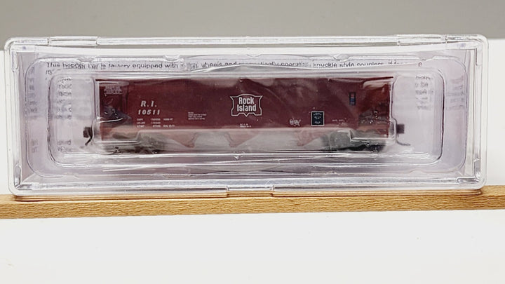 Bluford Shops 74204 N scale Rock Island R.I. 10511 three-bay offset-side hopper, side view in clear storage case.