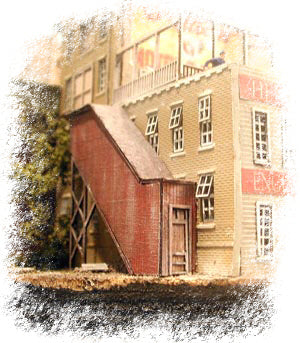 Bar Mills 0305 covered stairwell kit - assembled and painted example beside a building