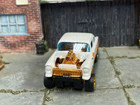 Pearl-white No. 52 Chevy Gasser custom Hot Wheels, front view with gold exposed engine