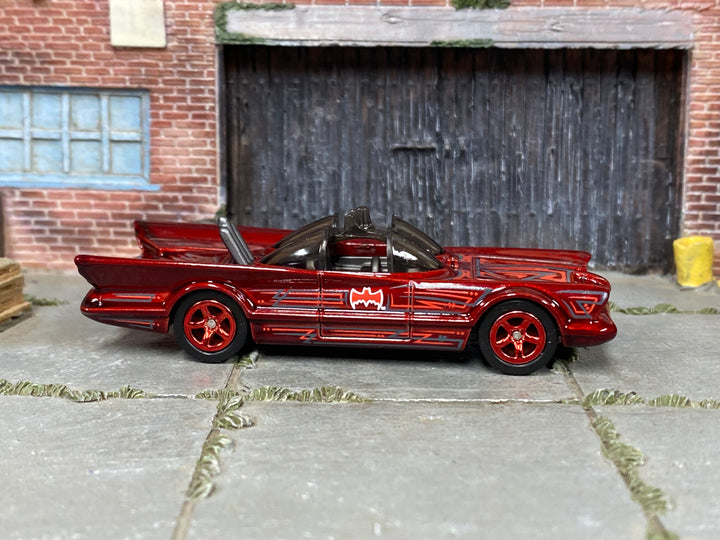 Custom Hot Wheels 1966 TV Batmobile metallic red finish with gray, red, and black Batman graphics with red wheels and rubber tires - side view