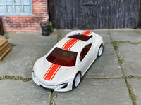 Custom Hot Wheels 2012 Acura NSX Concept in white and red with white 6-spoke wheels and rubber tires
