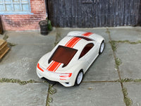 Custom Hot Wheels 2012 Acura NSX Concept in white and red with white 6-spoke wheels and rubber tires