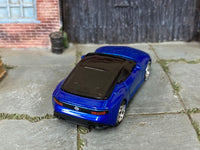 Rear three-quarter view of metallic-blue custom Hot Wheels 2023 Nissan Z