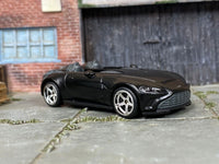 Custom Hot Wheels Aston Martin V12 Speedster in satin black with chrome race wheels and rubber tires