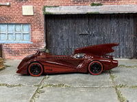 Custom Hot Wheels Batman Batmobile in burgundy with black mag wheels and redline rubber tires