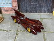 Custom Hot Wheels Batman Forever Batmobile – Burgundy – Gold Wheels – Rubber Tires – three-quarter view