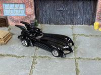 Batman Forever Batmobile gloss-black custom Hot Wheels with chrome wheels and rubber tires, view 2