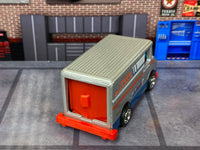 Tool Supply delivery truck custom Hot Wheels, rear view with orange cargo door and bumper