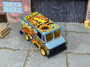 Custom Hot Wheels Combat Medic – VROOM Comic – Gold Wheels – Rubber Tires – three-quarter view