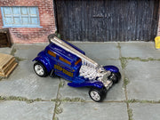 Custom Hot Wheels Deep Stage – Metallic Blue/Gold – Chrome Wheels – Rubber Tires – three-quarter view