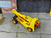 Custom Hot Wheels Dogfighter yellow aircraft-inspired body with black and red flame graphics with gold wheels with redline tires and rubber tires - three-quarter view