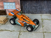 Custom Hot Wheels Dune It Up – Orange/Chrome – Chrome Off-Road Wheels – Rubber Tires – three-quarter view