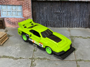 Custom Hot Wheels GT-Scorcher – Lime #5 – Printed Goodyear Rubber Tires – three-quarter view